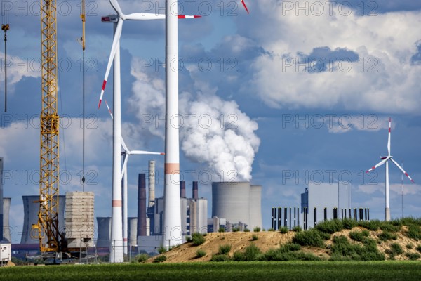 Construction site for the expansion of the wind farm east of Jackerath, in the Rhenish lignite mining area, in the background, the RWE lignite-fired power plant Neurath, North Rhine-Westphalia, Germany