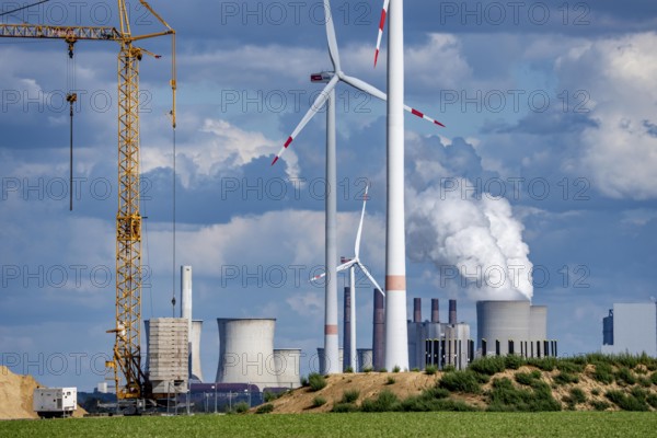 Construction site for the expansion of the wind farm east of Jackerath, in the Rhenish lignite mining area, in the background, the RWE lignite-fired power plant Neurath, North Rhine-Westphalia, Germany
