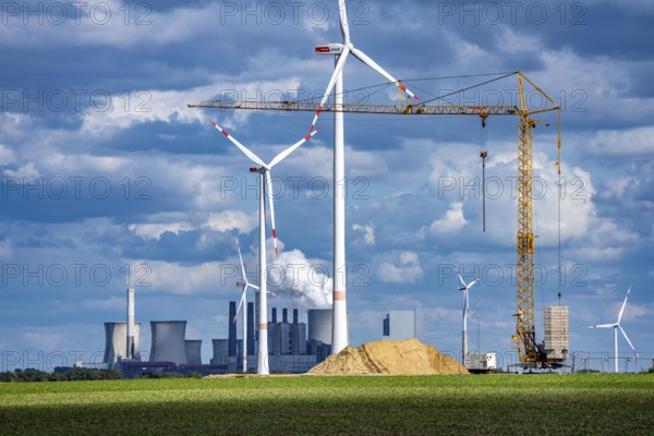 Construction site for the expansion of the wind farm east of Jackerath, in the Rhenish lignite mining area, in the background, the RWE lignite-fired power plant Neurath, North Rhine-Westphalia, Germany