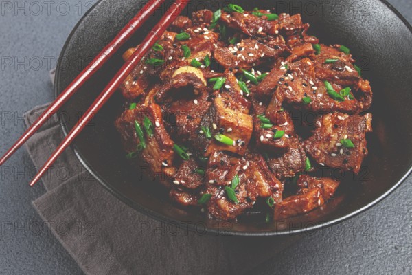 Bulgogi, with mushrooms, with sesame seeds and green onions, Korean cuisine, homemade, no people