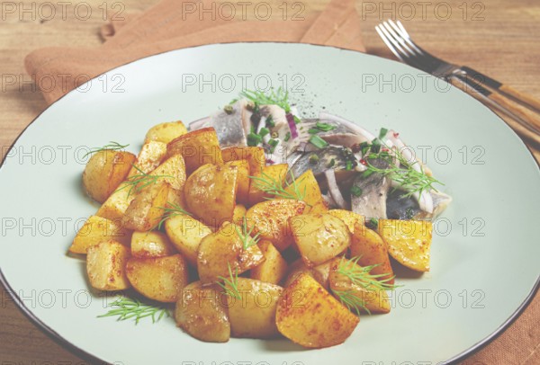 New potatoes, with pickled herring, and red onions, homemade, no people