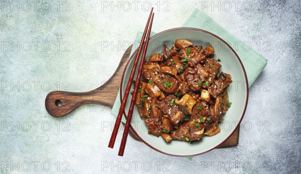 Bulgogi, with mushrooms, with sesame seeds and green onions, Korean cuisine, homemade, no people