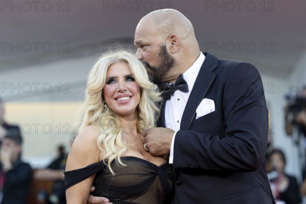 Venice, Italy - 1 September 2025: Franci Alberding Kerr and Mark Kerr during the Red Carpet of - The Smashing Machine - during the 82nd Venice International Film Festival