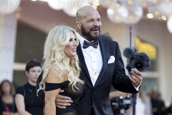 Venice, Italy - 1 September 2025: Franci Alberding Kerr and Mark Kerr during the Red Carpet of - The Smashing Machine - during the 82nd Venice International Film Festival