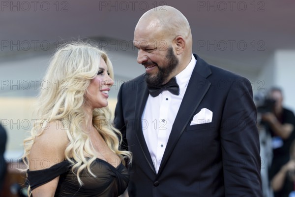Venice, Italy - 1 September 2025: Franci Alberding Kerr and Mark Kerr during the Red Carpet of - The Smashing Machine - during the 82nd Venice International Film Festival