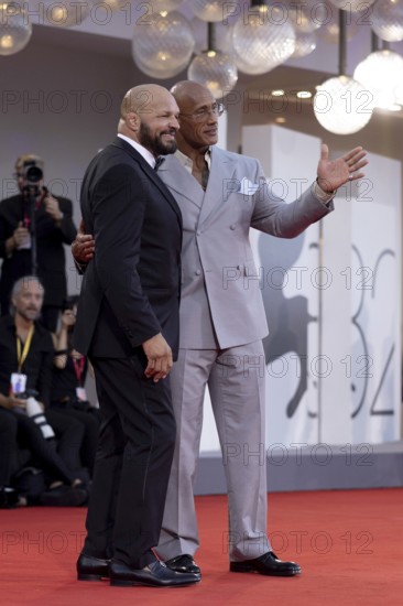 Venice, Italy - 1 September 2025: Mark Kerr, Dwayne Johnson during the red carpet of - The Smashing Machine - during the 82nd Venice International Film Festival