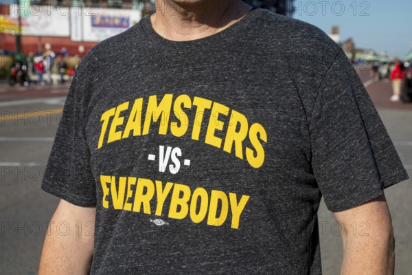 Detroit, Michigan USA - 1 September 2025 - Union members marched in Detroit's Labor Day parade. Many Teamsters wore a shirt reading 'Teamsters vs Everybody, ' which clashes with the labor movement's traditional 'solidarity forever' stance