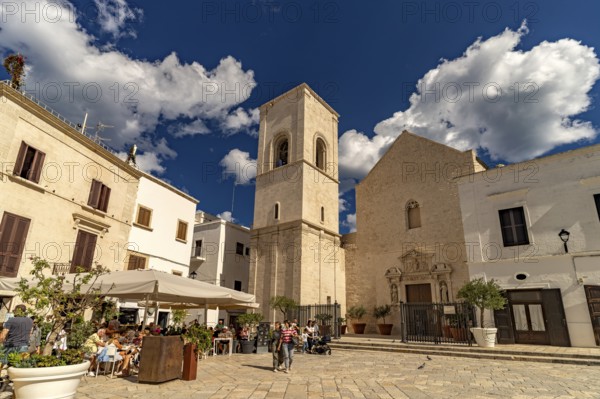 The square Piazza Vittorio Emanuele and the church Chiesa Madre di Santa Maria Assunta, Polignano a Mare, Apulia, Italy