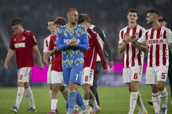 (DFL/DFB REGULATES PROHIBIT ANY USE OF PHOTOGRAPHS AS IMAGE SEQUENCES AND/OR QUASI-VIDEO), RheinEnergieStadion, Cologne, North Rhine-Westphalia, Marvin Schwäbe (1.FC Köln, Goalkeeper, #1), Eric Martel (1.FC Köln, midfield, #6), Tom Krauß (1.FC Köln, midfield, #5), 1. Fußball Bundesliga, 1.FC Köln, SC Freiburg on 31.08.2025 at the RheinEnergieStadion in Cologne Germany