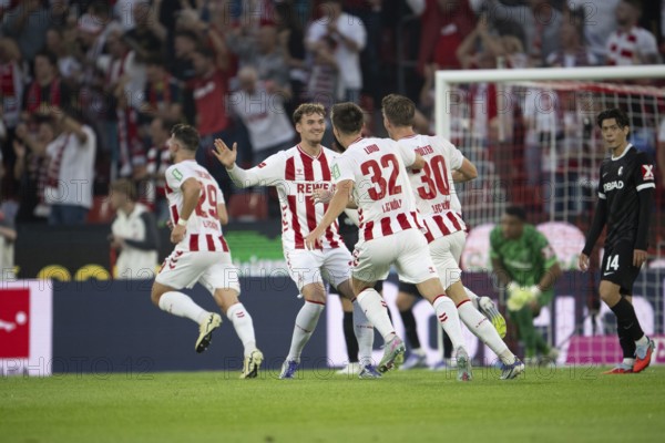 (DFL/DFB REGULATES PROHIBIT ANY USE OF PHOTOGRAPHS AS IMAGE SEQUENCES AND/OR QUASI-VIDEO), RheinEnergieStadion, Cologne, North Rhine-Westphalia, Kristoffer Lund (1.FC Köln, defence, #32), Jan Thielmann (1.FC Köln, midfield, #29), Marius Bülter (1.FC Köln, attack, #30), 1st Bundesliga, 1.FC Köln, SC Freiburg on 31/08/2025 at the RheinEnergieStadion in Cologne Germany