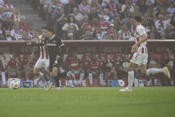 (DFL/DFB REGULATES PROHIBIT ANY USE OF PHOTOGRAPHS AS IMAGE SEQUENCES AND/OR QUASI-VIDEO), RheinEnergieStadion, Cologne, North Rhine-Westphalia, Denis Huseinbasic (1.FC Köln, midfield, #8), Yuito Suzuki (SC Freiburg, midfield, #14), 1st Bundesliga, 1.FC Köln, SC Freiburg on 31.08.2025 at the RheinEnergieStadion in Cologne Germany