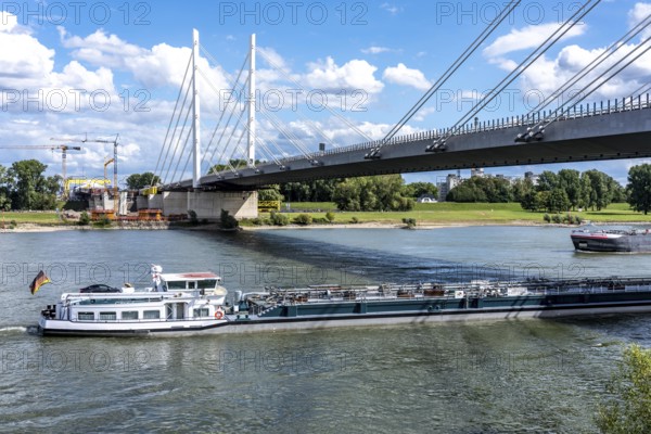 Cargo ships on the Rhine near Duisburg, Rhine bridge of the A40 Neuenkamp motorway, new construction, North Rhine-Westphalia, Germany