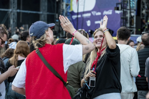 Visitors celebrate during Nelly Furtado's performance at the Superbloom Festival, Day 1 at the Olympiapark, Munich, 30/08/2025