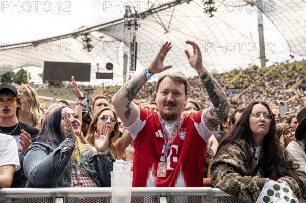 Festival visitors celebrate the performance of Roy Bianco & The Abbrunzati Boys at the Superbloom Festival, Day 1 at the Olympiapark, Munich, 30/08/2025