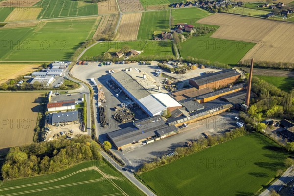 Aerial view, Raiffeisen Vital eG and Hüning Elementbau with chimney, Olfen-Kirchspiel, Olfen, Münsterland, North Rhine-Westphalia, Germany, DE, Europe, commercial enterprises, commercial area, commercial property, commercial site, commercial use, industrial area, industrial site, aerial photograph, aerial photography, aerial photography, overview, bird's eye view, birds-eyes view, overview