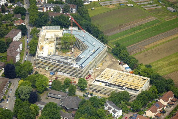 Aerial view, construction site with new building of the Anne-Frank comprehensive school on Obere Holtener Straße, Röttgersbach, Duisburg, Ruhr area, North Rhine-Westphalia, Germany, construction work, construction area, construction site, building plots, construction project, construction site, DE, Europe, aerial view, aerial photography, aerial photography, new building, Oberhausen, overview, bird's-eye view, overview, OberhausenNord