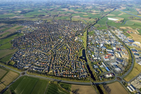 Aerial view, overview residential area Olfen, surrounded by meadows and fields, on the right Alte Fahrt and commercial area, Olfen-Stadt, Olfen, Münsterland, North Rhine-Westphalia, Germany, DE, Europe, commercial enterprises, commercial area, commercial area, commercial property, commercial location, commercial use, property tax, real estate, industrial site, aerial view, aerial photography, aerial photography, overview, bird's-eye view, residential area, housing and living, residential area, residential quality, residential neighbourhood, housing estate, residential district, birds-eyes view, overview