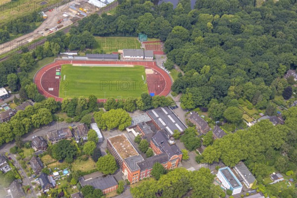 Aerial view, athletics stadium and football stadium at the Volkspark of FC. Sterkrade 72 e.V., Freiherr-Vom-Stein-Gymnasium, Alsfeld, Oberhausen, Ruhr area, North Rhine-Westphalia, Germany, education, educational institution, DE, Europe, football pitch, football stadium, football club, grammar school, teaching institute, athletics stadium, aerial view, aerial photography, aerial photography, school, sport, sports facilities, sports field, sports facility, stadium, overview, bird's-eye view, overview, OberhausenNord
