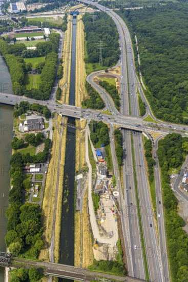 Aerial view, motorway junction Oberhausen-Zentrum and motorway bridges, motorway A42 and federal road B223, river Emscher, construction site Hinterer Blaupark, Oberhausen, Ruhr area, North Rhine-Westphalia, Germany, construction work, construction area, building site, building plots, construction project, construction site, DE, Europe, aerial view, aerial photography, aerial photography, new building, overview, bird's-eye view, bird's-eye view, overview, OberhausenSued