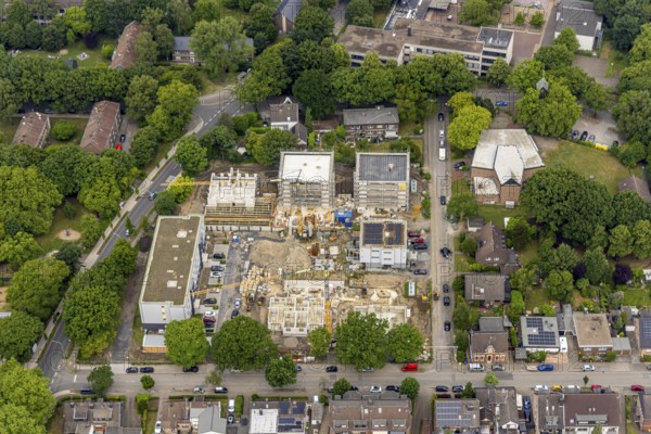 Aerial view, building area Elpenbachstraße and Schwarzwaldstraße, construction site with new residential building, school church and social church St. Jakobus, Tackenberg, Oberhausen, Ruhr area, North Rhine-Westphalia, Germany, place of worship, construction work, construction area, building site, building plots, construction project, construction site, DE, Europe, religious community, place of worship, holy place, church, parish, denomination, aerial view, aerial photography, aerial photography, new building, religion, religious site, overview, bird's-eye view, overview, OberhausenNord