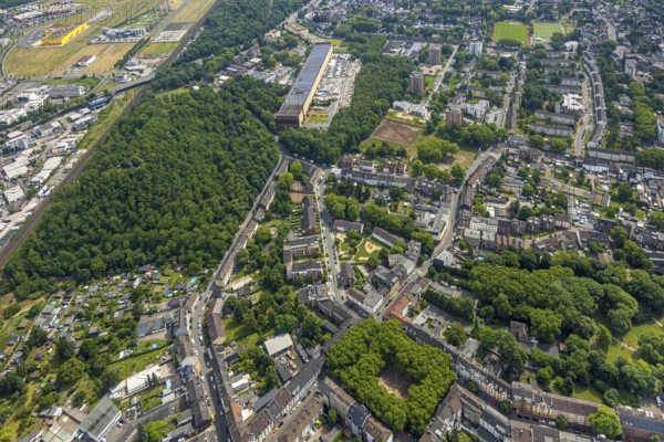 Aerial view, residential area with fallow land for future miners' school, Knappenstraße, high-rise residential area, left Knappenhalde and Walzen-Service-Center GmbH, Oberhausen, Ruhr area, North Rhine-Westphalia, Germany, construction site, DE, Europe, aerial view, aerial photography, aerial photography, school, overview, bird's-eye view, overview, OberhausenSued