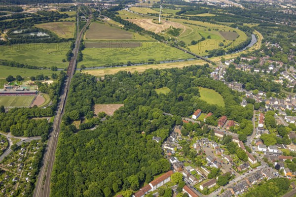 Aerial view, Ruhrpark forest area, railway bridge and river Ruhr with Ruhr bank, sports field in the forest, behind the energy park Styrumer Ruhrbogen, Oberhausen, Ruhr area, North Rhine-Westphalia, Germany, DE, Europe, aerial view, aerial photography, aerial photography, overview, birds-eyes view, overview, OberhausenSued