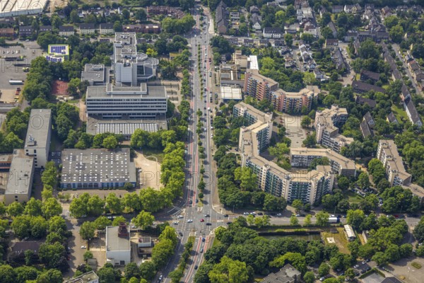 Aerial view, Berufsförderungswerk Oberhausen training centre, Bebelstraße with green trees, apartment block multi-family high-rise Bebelstraße, Oberhausen, Ruhr area, North Rhine-Westphalia, Germany, DE, Europe, property tax, real estate, aerial view, aerial photography, aerial photography, overview, bird's-eye view, housing estate, housing and living, quality of living, residential area, housing estate, residential district, birds-eyes view, overview, OberhausenSued