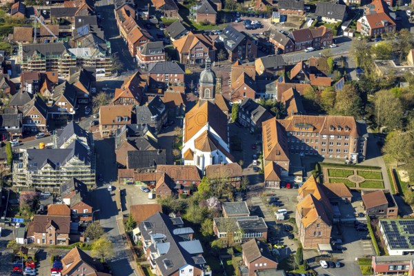 Aerial view, church St. Mauritius, children's sanatorium social institution at Mauritiusplatz, top left town hall municipal administration construction site with conversion and renovation, corner Bohlenstraße and Bergstraße, Nordkirchen, Münsterland, North Rhine-Westphalia, Germany, place of worship, construction work, construction area, building site, building plots, construction measure, construction project, construction site, authority, community centre, DE, Europe, religious community, place of worship, holy place, hospital, church, parish, denomination, infirmary, hospital, aerial view, aerial photography, aerial photography, medical facility, medical aid, town hall, religion, religious site, city administration, overview, bird's-eye view, birds-eyes view, overview, medical care