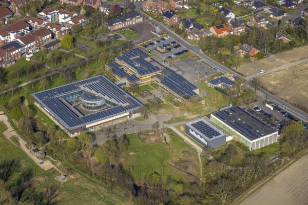 Aerial view, Johann-Conrad-Schlaun-Schule, comprehensive school with solar roof, Nordkirchen, Münsterland, North Rhine-Westphalia, Germany, education, educational institution, DE, Europe, photovoltaic, comprehensive school, educational institute, aerial view, aerial photography, aerial photography, photovoltaic system, school, solar, solar system, solar roof, solar energy, solar panel, solar power system, overview, bird's-eye view, bird's-eye view, overview