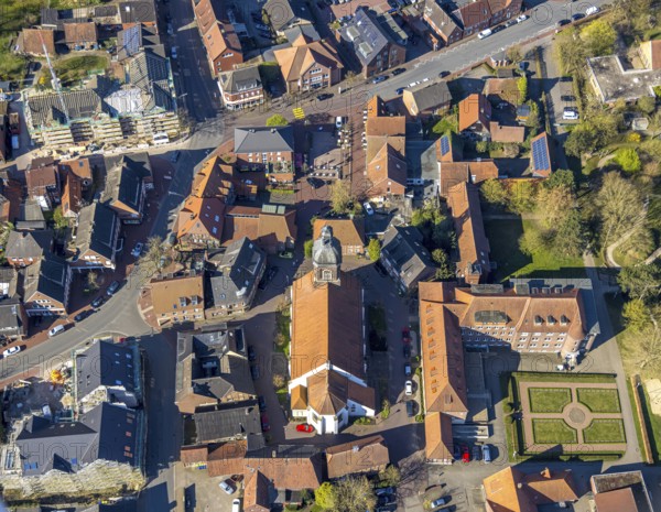 Aerial view, church St. Mauritius, children's sanatorium social institution at Mauritiusplatz, top left town hall municipal administration construction site with conversion and renovation, corner Bohlenstraße and Bergstraße, Nordkirchen, Münsterland, North Rhine-Westphalia, Germany, place of worship, construction work, construction area, building site, building plots, construction measure, construction project, construction site, authority, community centre, DE, Europe, religious community, place of worship, holy place, hospital, church, parish, denomination, infirmary, hospital, aerial view, aerial photography, aerial photography, medical facility, medical aid, town hall, religion, religious site, city administration, overview, bird's-eye view, birds-eyes view, overview, medical care