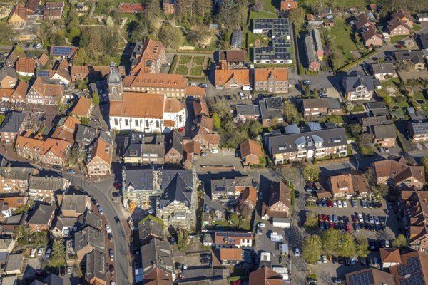 Aerial view, church St. Mauritius, children's sanatorium social institution at Mauritiusplatz, construction site with new building for planned project Haus Westermann for Caritasverband at the corner of Schlossstraße and Mühlenstraße, Nordkirchen, Münsterland, North Rhine-Westphalia, Germany, place of worship, construction work, construction area, building site, building plots, construction project, construction site, authority, community centre, DE, Europe, religious community, place of worship, holy place, hospital, church, parish, denomination, infirmary, hospital, aerial view, aerial photography, aerial photography, medical facility, medical aid, town hall, religion, religious site, city administration, overview, bird's-eye view, birds-eyes view, overview, medical care