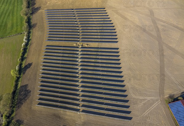Aerial photo, solar park, open space photovoltaic plant in the farming community of Berger, Nordkirchen, Münsterland, North Rhine-Westphalia, Germany, DE, Europe, photovoltaic, aerial photo, aerial photography, aerial photography, photovoltaic plant, solar, solar plant, solar energy, solar panel, solar power plant, overview, bird's-eye view, overview