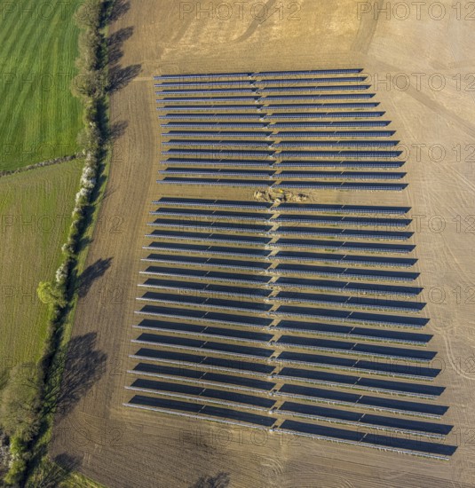 Aerial photo, solar park, open space photovoltaic plant in the farming community of Berger, Nordkirchen, Münsterland, North Rhine-Westphalia, Germany, DE, Europe, photovoltaic, aerial photo, aerial photography, aerial photography, photovoltaic plant, solar, solar plant, solar energy, solar panel, solar power plant, overview, bird's-eye view, overview