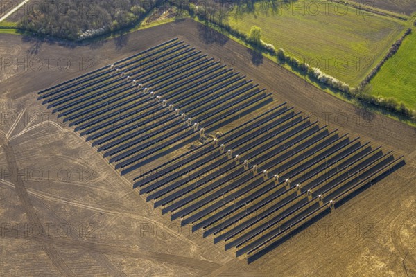 Aerial photo, solar park, open space photovoltaic plant in the farming community of Berger, Nordkirchen, Münsterland, North Rhine-Westphalia, Germany, DE, Europe, photovoltaic, aerial photo, aerial photography, aerial photography, photovoltaic plant, solar, solar plant, solar energy, solar panel, solar power plant, overview, bird's-eye view, overview