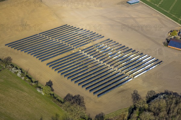 Aerial photo, solar park, open space photovoltaic plant in the farming community of Berger, Nordkirchen, Münsterland, North Rhine-Westphalia, Germany, DE, Europe, photovoltaic, aerial photo, aerial photography, aerial photography, photovoltaic plant, solar, solar plant, solar energy, solar panel, solar power plant, overview, bird's-eye view, overview