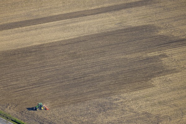 Aerial view, agricultural work with tractor on a field, Ascheberger Straße, Capelle, Nordkirchen, Münsterland, North Rhine-Westphalia, Germany, agricultural landscape, DE, Europe, agricultural machinery, agriculture, agricultural fields, aerial photograph, aerial photography, aerial photography, overview, bird's-eye view, bird's-eye view, overview