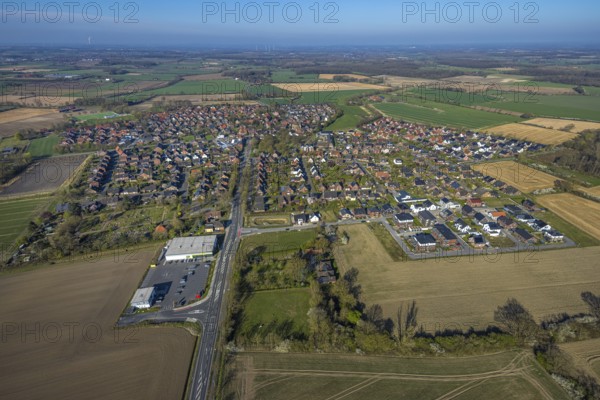 Aerial view, residential area local view Capelle, Bahnhofstraße with new building Netto supermarket, on the right residential buildings new building area Zur Brede, Capelle, Nordkirchen, Münsterland, North Rhine-Westphalia, Germany, DE, Europe, aerial view, aerial photography, aerial photography, overview, bird's-eye view, overview