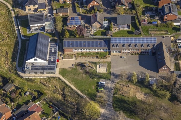 Aerial view, Capelle primary school with solar roof, Capelle, Nordkirchen, Münsterland, North Rhine-Westphalia, Germany, education, educational institution, DE, Europe, photovoltaic, educational institute, aerial view, aerial photography, aerial photography, photovoltaic system, school, solar, solar system, solar roof, solar energy, solar panel, solar power system, overview, bird's-eye view, bird's-eye view, overview