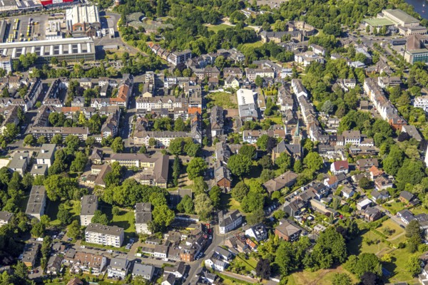 Aerial view, residential area with Pestalozzi School - Städt. Bülowstraße primary school and Bärenhöhle municipal day care centre. Day care centre for children Bärenhöhle, evang. Church Wilhelminenstraße, Broich - Ost, Mülheim an der Ruhr, Ruhr area, North Rhine-Westphalia, Germany, place of worship, education, educational institution, DE, Europe, religious community, place of worship, primary school, holy place, kindergarten, day care centre, day care centre for children, church, church community, day care centre, denomination, educational institute, aerial view, aerial photography, aerial photography, religion, religious site, school, overview, bird's-eye view, overview