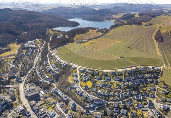 Aerial view, Hennesee dam with wooded area and hilly landscape, meadows and fields with residential area, Meschede town, Meschede, Sauerland, North Rhine-Westphalia, Germany, DE, Europe, property tax, Hennetalsperre, real estate, aerial view, aerial photography, aerial photography, overview, bird's-eye view, residential area, living and living, residential area, quality of living, residential neighbourhood, housing estate, residential area, birds-eyes view, overview