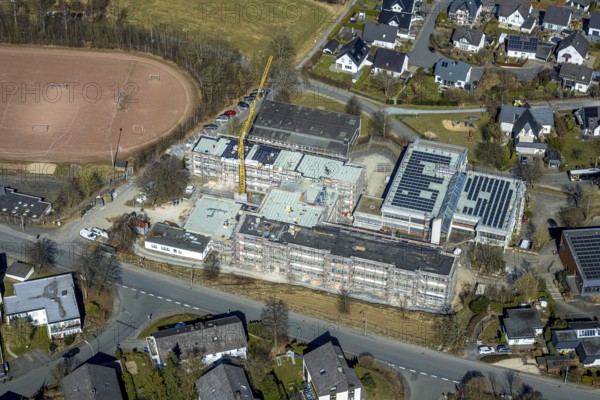 Aerial view, construction site with new building of the secondary school of the city of Meschede, Meschede city, Meschede, Sauerland, North Rhine-Westphalia, Germany, construction work, construction area, construction site, building plots, construction measure, construction project, construction site, education, educational institution, DE, Europe, educational institute, aerial view, aerial photography, aerial photography, new building, secondary school, school, overview, bird's eye view, bird's eye view, overview