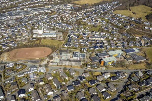 Aerial view, construction site with new building, secondary school of the city of Meschede, secondary school of the city of Meschede, Deutsche Telekom headquarters at the sports field school centre, Meschede city, Meschede, Sauerland, North Rhine-Westphalia, Germany, construction work, construction area, building site, building plots, construction measure, construction project, construction site, education, educational institution, DE, Europe, secondary school, teaching institute, aerial view, aerial photography, aerial photography, new building, secondary school, school, overview, bird's eye view, bird's eye view, overview