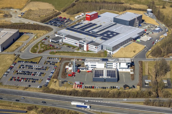 Aerial view, Enste industrial estate with citizen solar park on the A46 motorway, ITH Schraubtechnik, Enste, Meschede, Sauerland, North Rhine-Westphalia, Germany, DE, Europe, photovoltaics, commercial enterprises, commercial space, commercial area, commercial property, commercial site, commercial use, industrial area, industrial site, aerial view, aerial photography, aerial photography, photovoltaic plant, solar, solar plant, solar roof, solar energy, solar panel, solar park, solar power plant, overview, bird's-eye view, overview