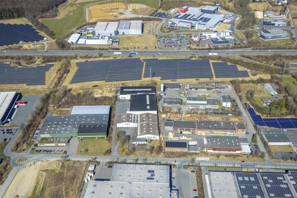 Aerial view, commercial area Enste with citizen solar park at the motorway A46, Enste, Meschede, Sauerland, North Rhine-Westphalia, Germany, DE, Europe, photovoltaic, commercial enterprises, commercial area, commercial property, commercial site, commercial use, industrial area, industrial site, aerial view, aerial photography, aerial photography, photovoltaic plant, solar, solar plant, solar roof, solar energy, solar panel, solar park, solar power plant, overview, bird's-eye view, birds-eyes view, overview