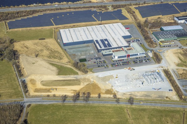 Aerial view, commercial area Enste with citizen solar park at the motorway A46, Enste, Meschede, Sauerland, North Rhine-Westphalia, Germany, DE, Europe, photovoltaic, commercial enterprises, commercial area, commercial property, commercial site, commercial use, industrial area, industrial site, aerial view, aerial photography, aerial photography, photovoltaic plant, solar, solar plant, solar roof, solar energy, solar panel, solar park, solar power plant, overview, bird's-eye view, birds-eyes view, overview