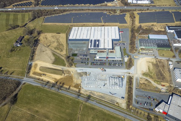 Aerial view, commercial area Enste with citizen solar park at the motorway A46, Enste, Meschede, Sauerland, North Rhine-Westphalia, Germany, DE, Europe, photovoltaic, commercial enterprises, commercial area, commercial property, commercial site, commercial use, industrial area, industrial site, aerial view, aerial photography, aerial photography, photovoltaic plant, solar, solar plant, solar roof, solar energy, solar panel, solar park, solar power plant, overview, bird's-eye view, birds-eyes view, overview