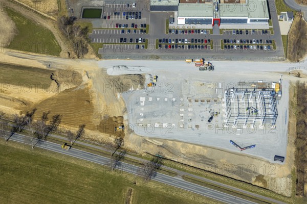 Aerial view, construction site with wire scaffolding next to Briloner Leuchten Werk, Enste, Meschede, Sauerland, North Rhine-Westphalia, Germany, construction work, construction area, building site, building plots, construction project, construction site, DE, Europe, aerial view, aerial photography, aerial photography, new building, overview, bird's-eye view, overview
