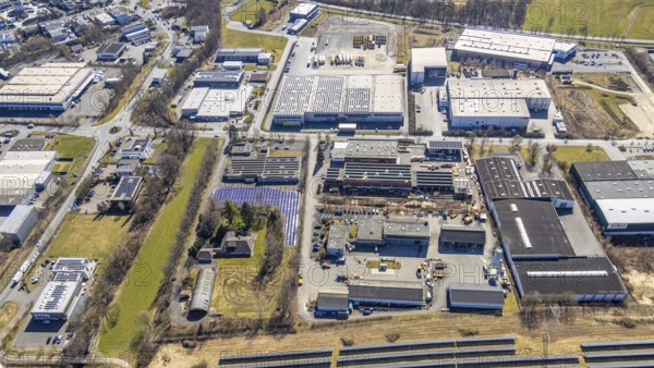 Aerial view, commercial area Enste with citizen solar park at the motorway A46, Enste, Meschede, Sauerland, North Rhine-Westphalia, Germany, DE, Europe, photovoltaic, commercial enterprises, commercial area, commercial property, commercial site, commercial use, industrial area, industrial site, aerial view, aerial photography, aerial photography, photovoltaic plant, solar, solar plant, solar roof, solar energy, solar panel, solar park, solar power plant, overview, bird's-eye view, birds-eyes view, overview