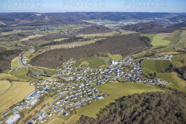 Aerial view, residential area local view district Calle, church St. Severin and cemetery, wooded area and hilly landscape, Calle, Meschede, Sauerland, North Rhine-Westphalia, Germany, place of worship, burial place, DE, Europe, cemetery, memorial, religious community, place of worship, house of God, property tax, graves, burial ground, sacred site, real estate, church, parish, denomination, aerial view, aerial photography, aerial photography, religion, religious site, resting place, overview, bird's-eye view, residential complex, living and life, residential area, quality of life, residential neighbourhood, housing estate, residential district, birds-eyes view, overview
