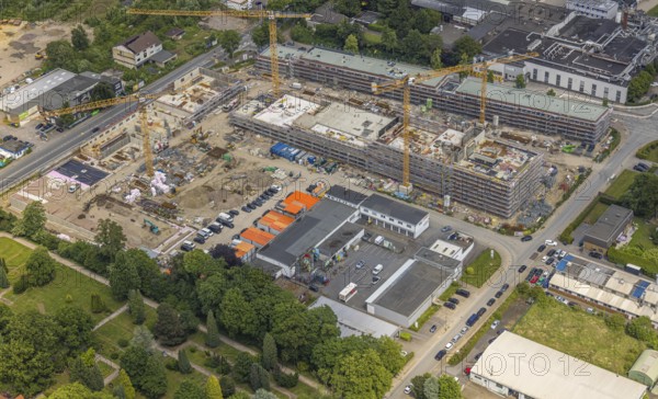 Aerial view, construction site with new building in the commercial area Am Trimbuschhof, Sodingen, Herne, Ruhr area, North Rhine-Westphalia, Germany, Am Trimbuschhof, arrangement, architecture, construction work, construction area, construction site, building plots, construction cranes, construction project, construction site, business area, DE, drone image, development, Europe, progress, building, terrain, commercial buildings, commercial enterprises, commercial area, commercial area, commercial property, commercial park, commercial site, commercial use, industrial area, industrial site, infrastructure, construction, land development, aerial photography, aerial photography, aerial photography, machinery, new construction, perspective, regions, summer, city view, urban development, urban planning, daylight, technology, overview, urban, bird's-eye view, economy, birds-eyes view, modern, overview, HernerechtsderA43